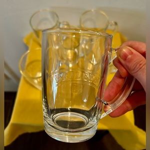 2 Bailey’s Irish cream etched coffee mugs.